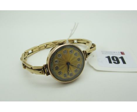 A Vintage Ladies Wristwatch, the circular textured two tone dial with Arabic numerals, the movement stamped "15 Jewels", with
