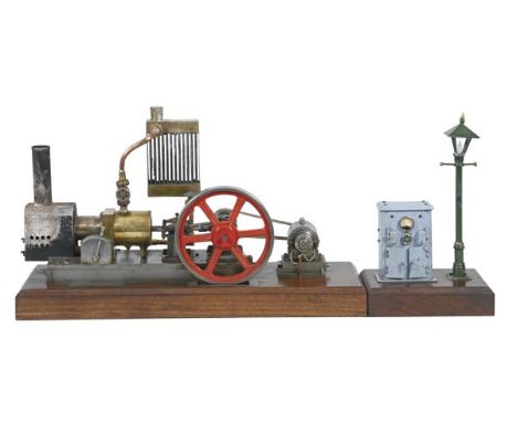 A model of a Bremen horizontal hot air mill engine, built by the late Mr Brian Marshall of Chichester, with single cylinder b