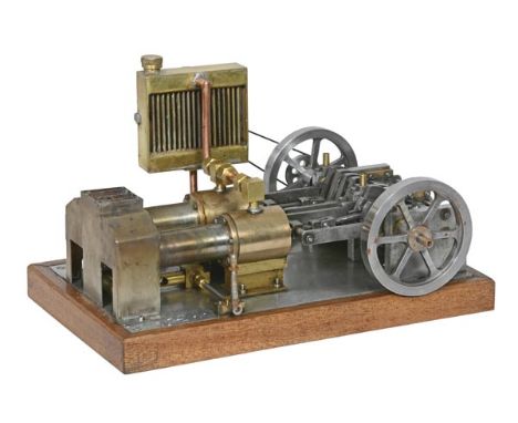 A model of a Bremen twin cylinder hot air engine, built by the late Mr Brian Marshall of Chichester, the engine is similar in