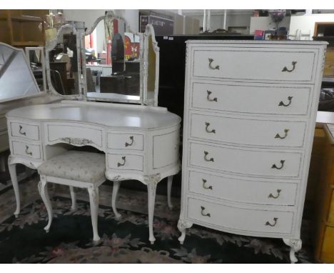 A Cream and Gilt Kidney Shaped Dressing Table with Triple Mirror and Stool Together with Matching Bow Front Six Drawer Chest 