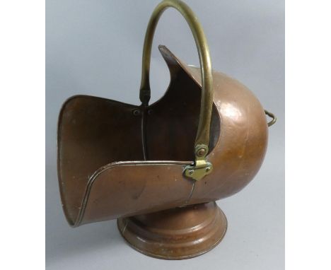 A Copper and Brass Helmet Shaped Coal Scuttle, 40cm Long 