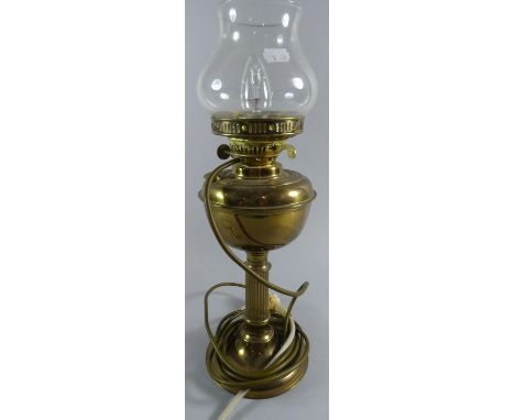 A Brass Oil Lamp Converted to Electricity, 44cm High 