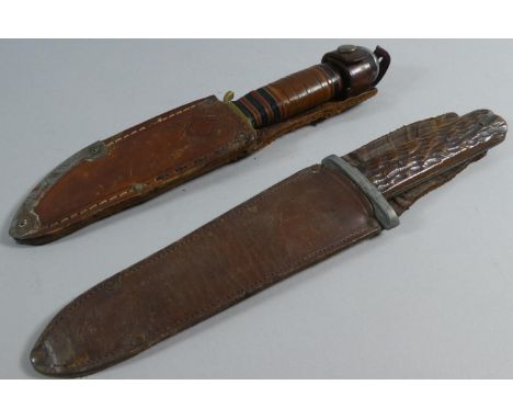 Two Hunting Knives in Leather Sheaths, One Stamped Puma Sport Messer, Solingen