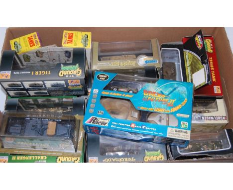 A collection of mixed modern issue military related diecast vehicles to include WWII ground armour and scale model tanks of H