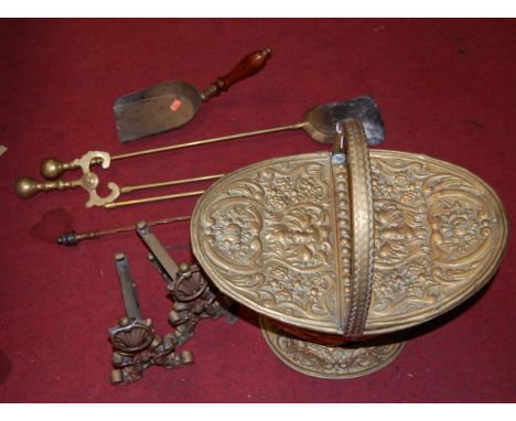 A Victorian pressed brass coal scuttle together with various turned brass fire tools, pair of brass andirons etc