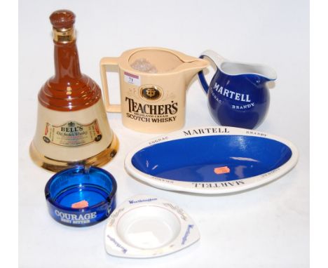 A Wade Bell's Scotch Whisky bell; together with various other advertising items to include Courage Best Bitter blue glass ash