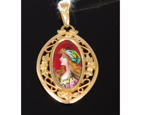 A Limoges yellow metal and enamel pendant depicting a profile portrait of a maiden, signed verso Le Clement, Limoges, 2.7cm (