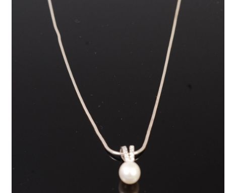 A modern silver necklace, having silver cultured pearl and paste set pendant