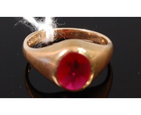 A 9ct gold and slice-cut ruby(?) signet ring, size N, 3.2g