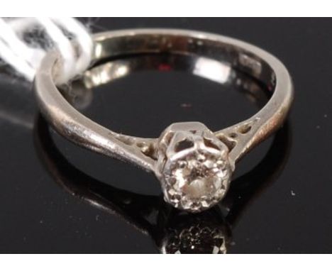 An 18ct white gold diamond solitaire ring, the illusion set old cut diamond weighing approx 0.25ct, 2.1g, size I