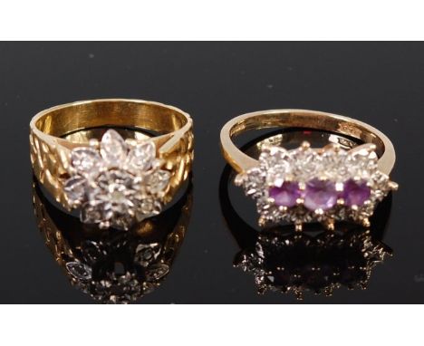 A modern 18ct gold diamond flower head cluster ring, size M-; together with a 9ct gold amethyst three stone dress ring, gross