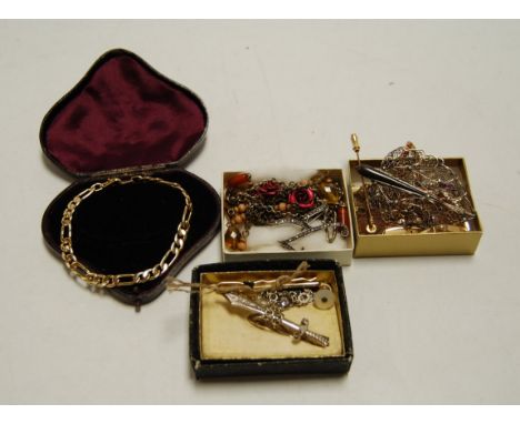 A small collection of assorted costume and other jewellery to include; gold plated curblink bracelet, yellow metal hardstone 