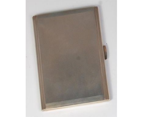 An Art Deco silver pocket cigarette case, of all-over engine turned form, with stepped edges, having gilt washed interior, en