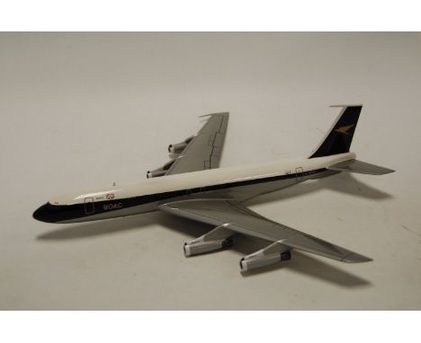 Two boxed Bravo Delta models resin scale aircraft, both boxed but missing stands to include a BOAC Boeing 707, and an F16 A C