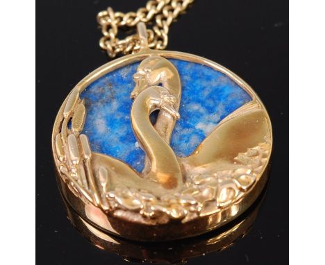 A modern 9ct gold and lapis lazuli set pendant, on chainlink neck chain, in original Spink & Son Ltd fitted box, dia.3cm