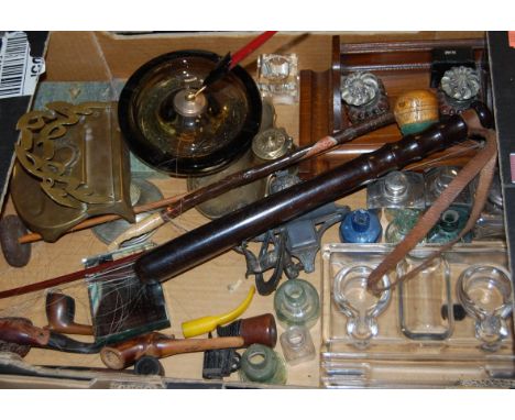 A box of miscellaneous items to include; turned wooden policeman's truncheon, brass inkwell, pipes etc    Condition Report / 