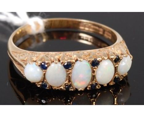 A 9ct gold, opal and sapphire point five stone dress ring, size T, 3.8g