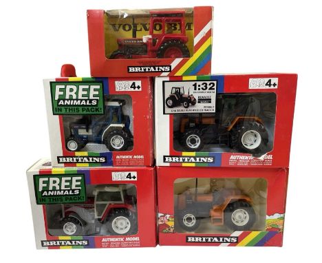 Five boxed Britains die-cast tractor models, to include: - Renault TZ16 Double Rear Wheeled - Volvo BM - Ford 2120 - Massey F