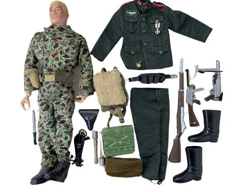 A 1964 Palitoy Action Man figure, together with an extra outfit and accessories.
