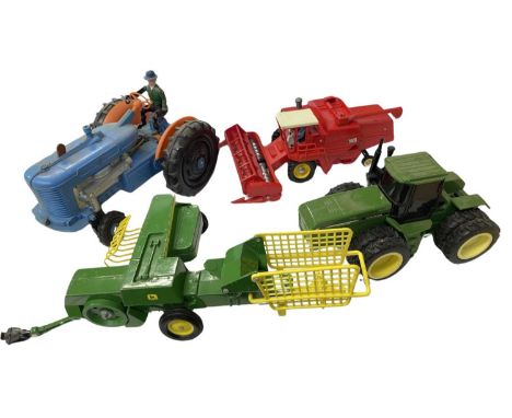 Four large scale model agricultural vehicles, to include: - John Deere tractor - Britains 1978 Massey Ferguson Combine Harves