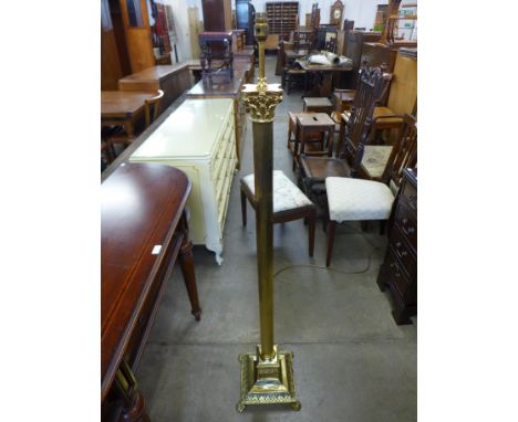 A brass Corinthian column standard lamp 