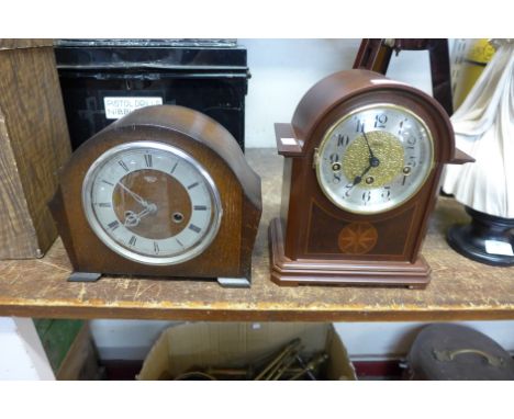 An Art Deco oak mantel clock, cuckoo clock and another 