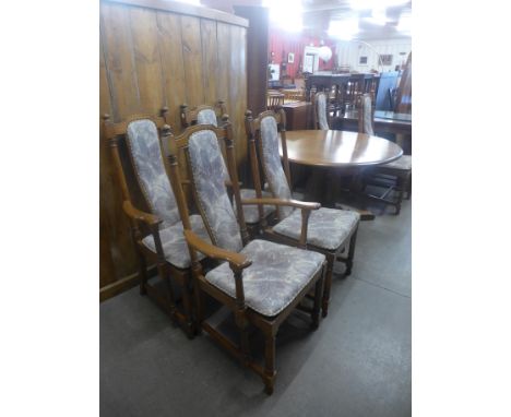 An Ercol Golden Dawn extending dining table and six chairs 