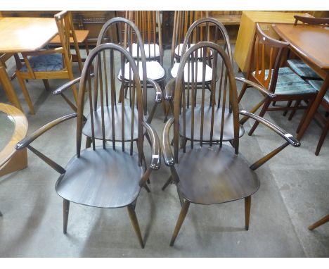 A set of four Ercol armchairs 