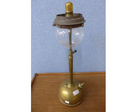 A Victorian brass lamp 