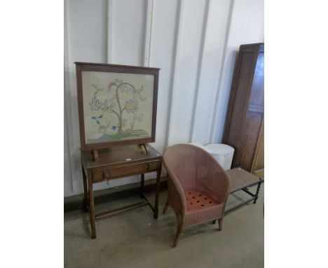 A tapestry fire screen, wicker ware, Art Deco oak side table and a stool 