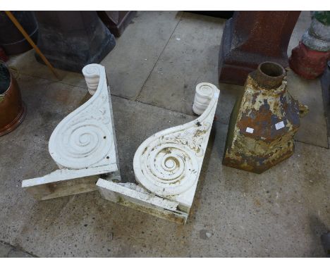 A pair of composite wall brackets and a cat iron drain hopper 