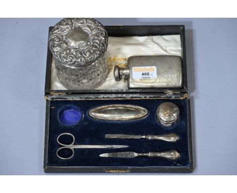 Part silver manicure set, silver lidded dressing table bottle and hip flask 