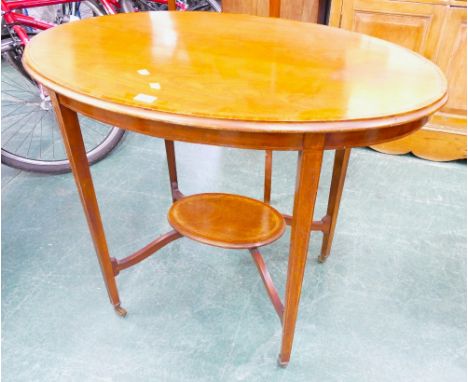 Edwardian oval occasional table with single shelf to base.  Height 70 cm, width 90 cm