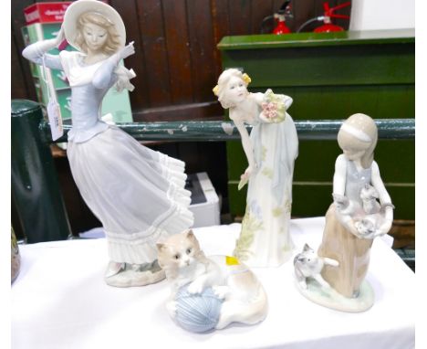 Four Lladro, Nao and Royal Doulton figurines 