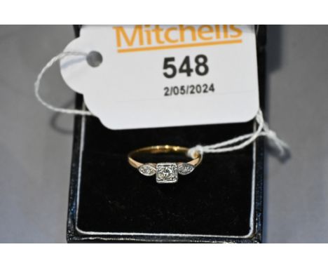 Yellow metal ring with illegible hallmark set with diamonds, size K