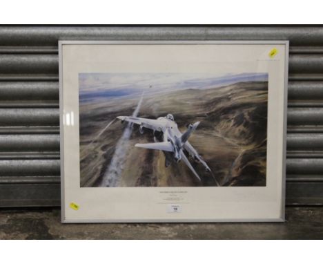 A FRAMED AND GLAZED ROBERT TAYLOR PRINT ENTITLED 'AIR STRIKE OVER  WEST FALKLAND', SIGNED LT. COMMANDER SHARKEY WARD, OVERALL