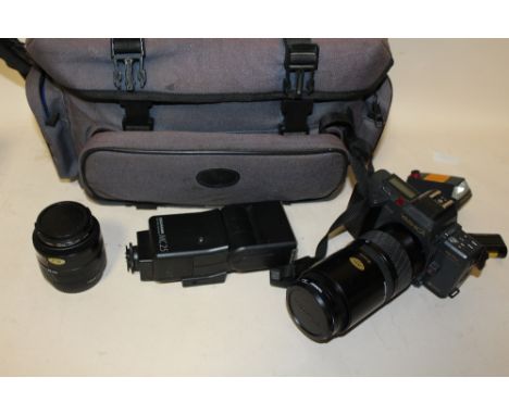 A YASHICA KYOCERA 320AF CAMERA IN CARRY CASE WITH ACCESSORIES