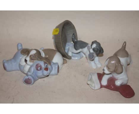 THREE NAO PUPPY FIGURES 