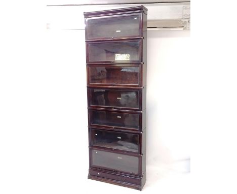 A 7-shelf Globe-Wernicke bookcase, W87cm, H252cm, D25cm (with labels) 