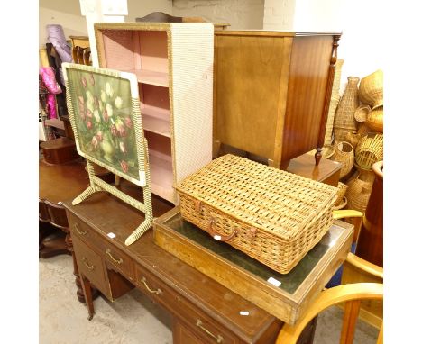 A coracle wicker picnic hamper, a table-top jewellery display cabinet, a wicker open bookcase and a folding tea table (4)