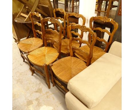 A set of 6 French oak ladder-back rush-seated chairs 