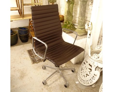 A Charles Eames design adjustable swivel desk chair, with cast aluminium frame, on 5-star wheeled base, for ICF, with label 