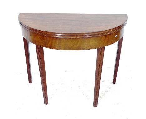 A Victorian walnut and mahogany demilune fold over card table, W90cm, H74cm, D46cm 