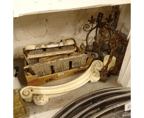 A quantity of carved wood and gesso mouldings, and a pair of wrought-iron lantern stands 