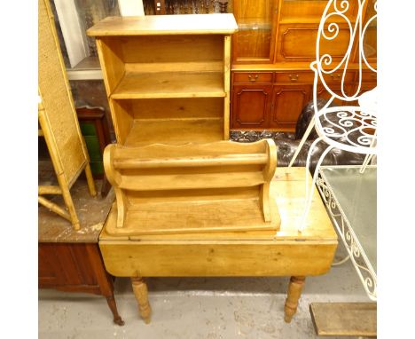 A Victorian pine Pembroke table with end frieze drawer, W102cm, a hanging pine towel rail shelf, and a small open bookcase, W