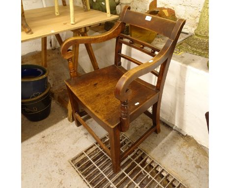 An 18th century oak desk chair 