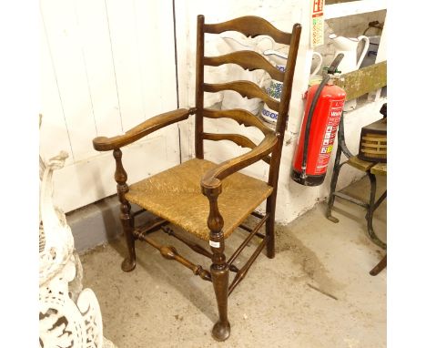A Lancaster style beech and ladder-back and rush-seated elbow chair 