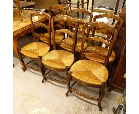 A set of 6 French ladder-back and rush-seated dining chairs