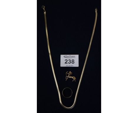 A 9ct gold ring and 9ct gold charm, weight 9.1g approx, together with a yellow metal chain. (B.P. 24% incl. VAT)