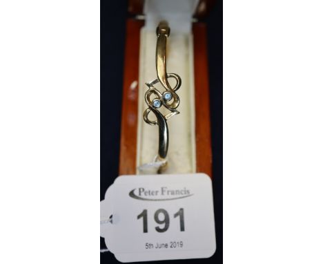 9ct Clogau gold bangle set with blue topaz.(B.P. 24% incl. VAT) CONDITION REPORT: 11.2g approximately.